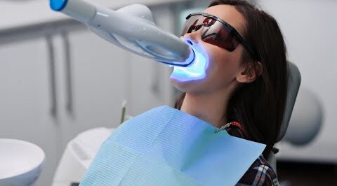Teeth Whitening With Lamp At The Dental Chair